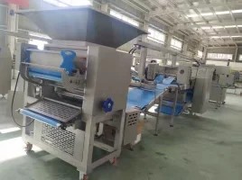 ZKSD900 Auto. pastry lamination line with 2 sets of auto.freezers on the ground and auto.panning machine